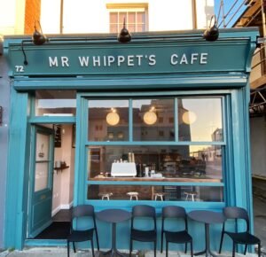 Mr Whippets Cafe on Sandagte high street, with table and chairs outside